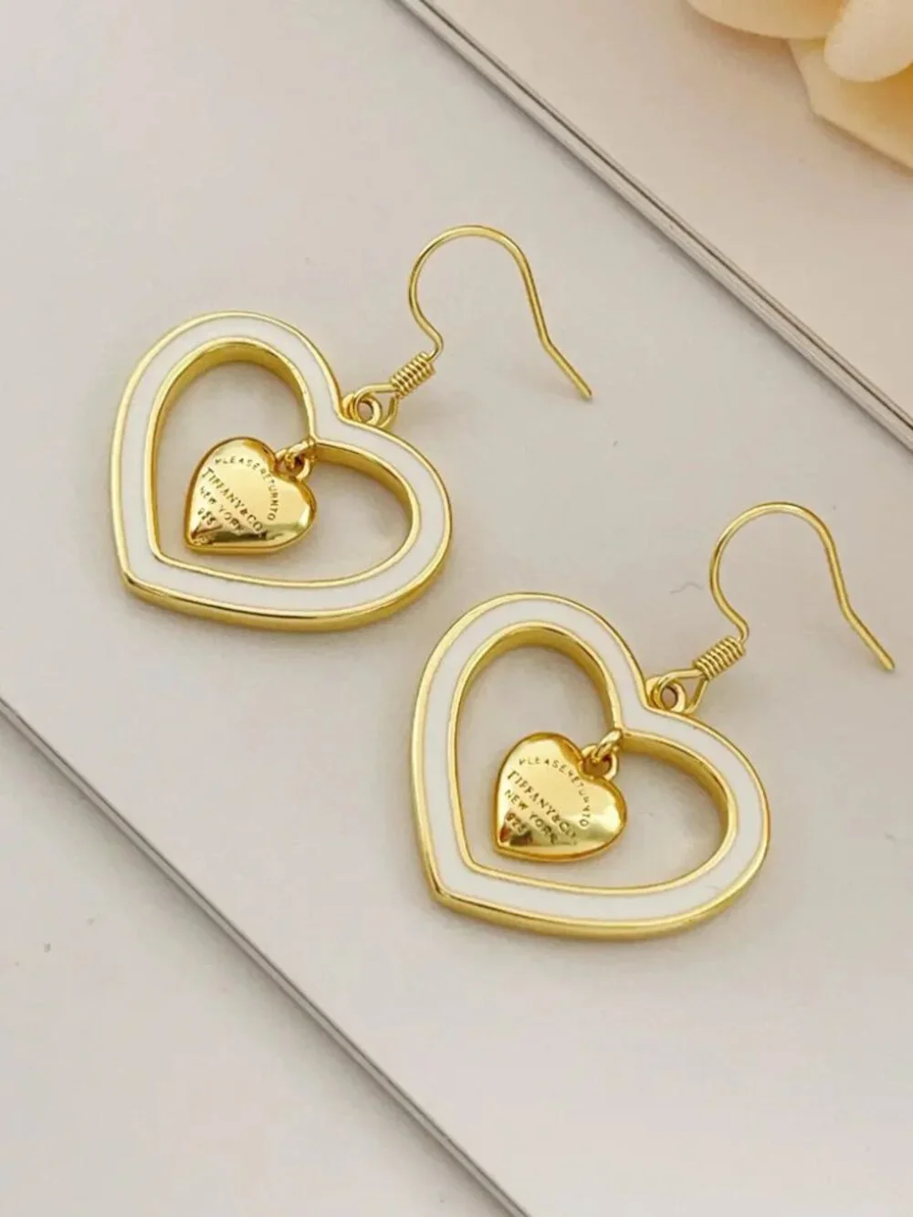 Tiffany & Co. Gold Tassel White Heart Earrings